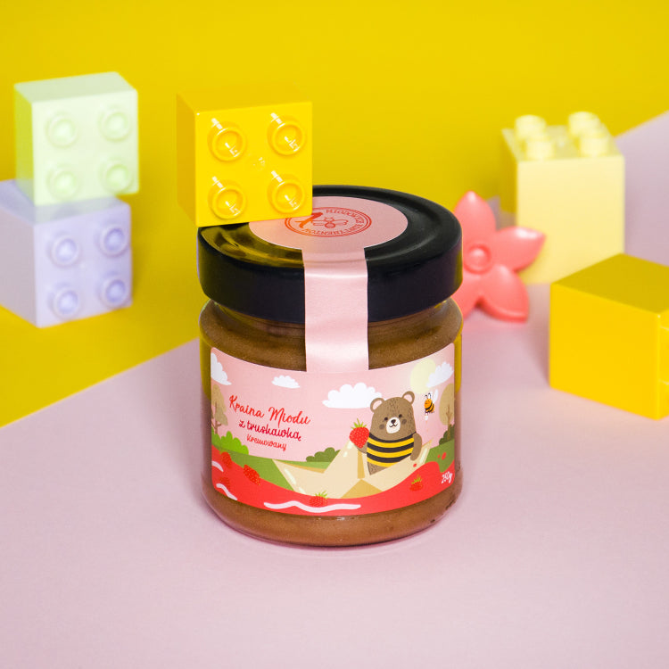 Kraina miodu - miód kremowany z truskawką 250g